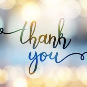 A thank you message written in blue ink.