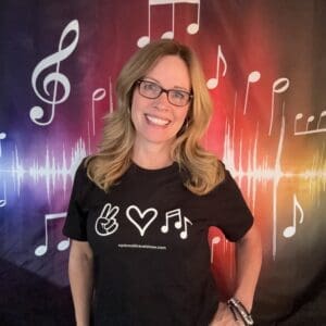 A woman standing in front of musical notes.